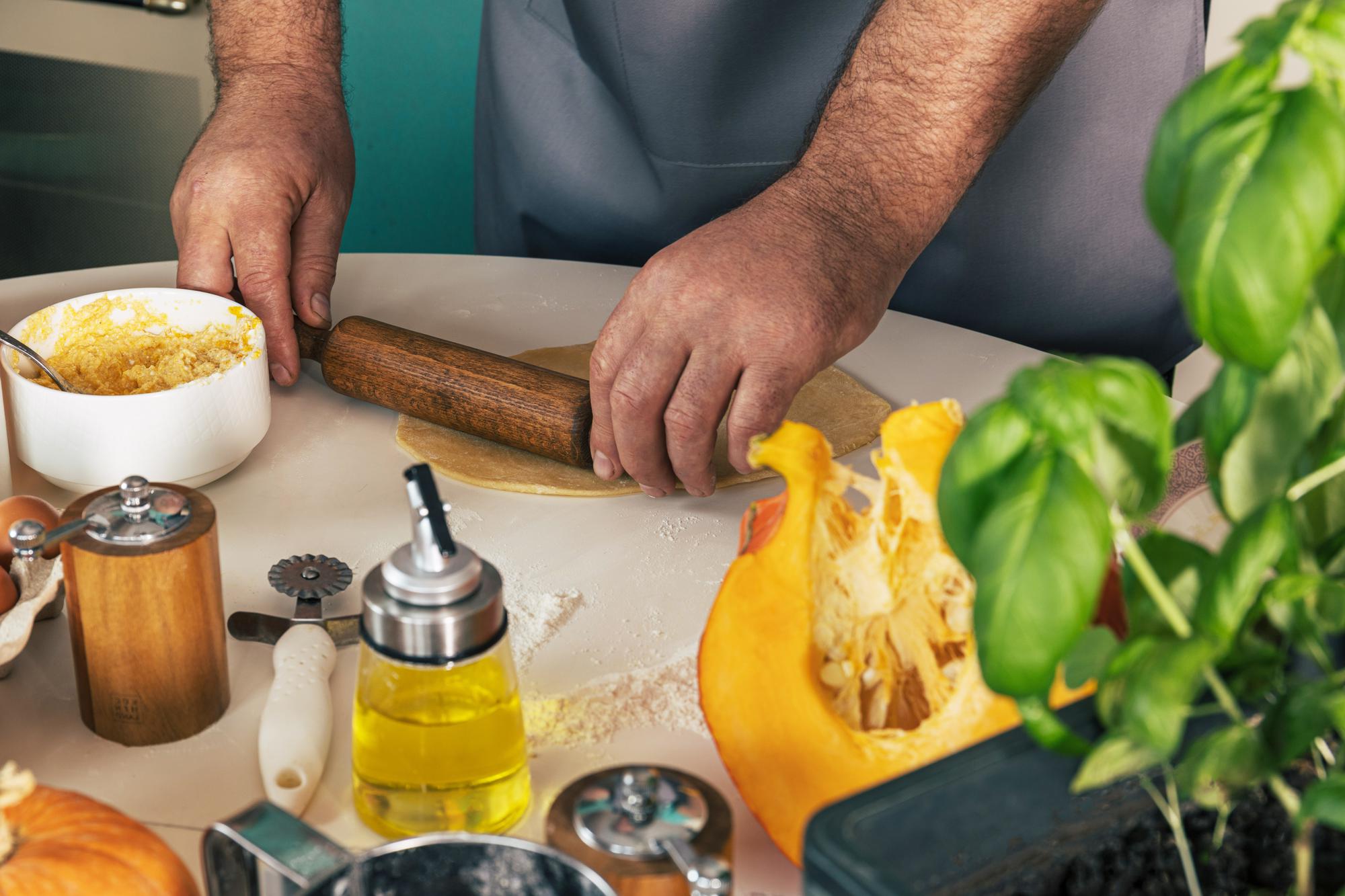Local chef preparing regional ingredients on a wooden table