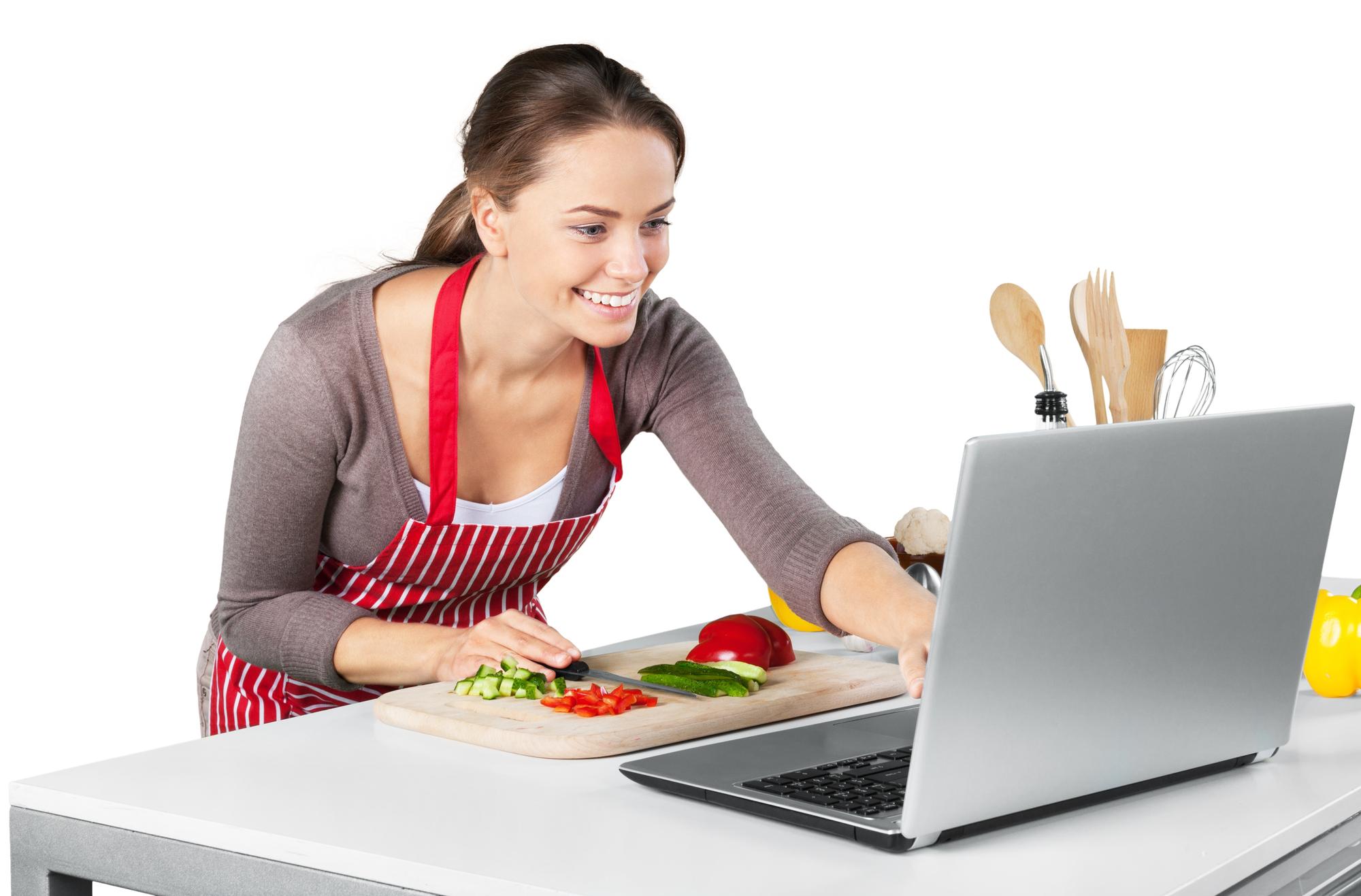 Student cooking with instructor via video call